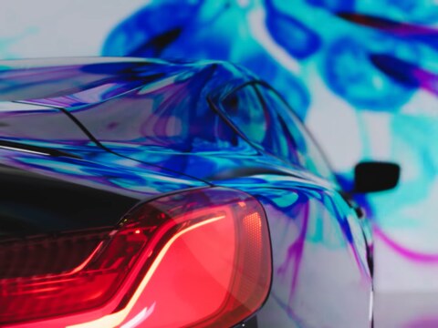 Ray-traced reflections on a car body, from Unity's real-time ray tracing demo